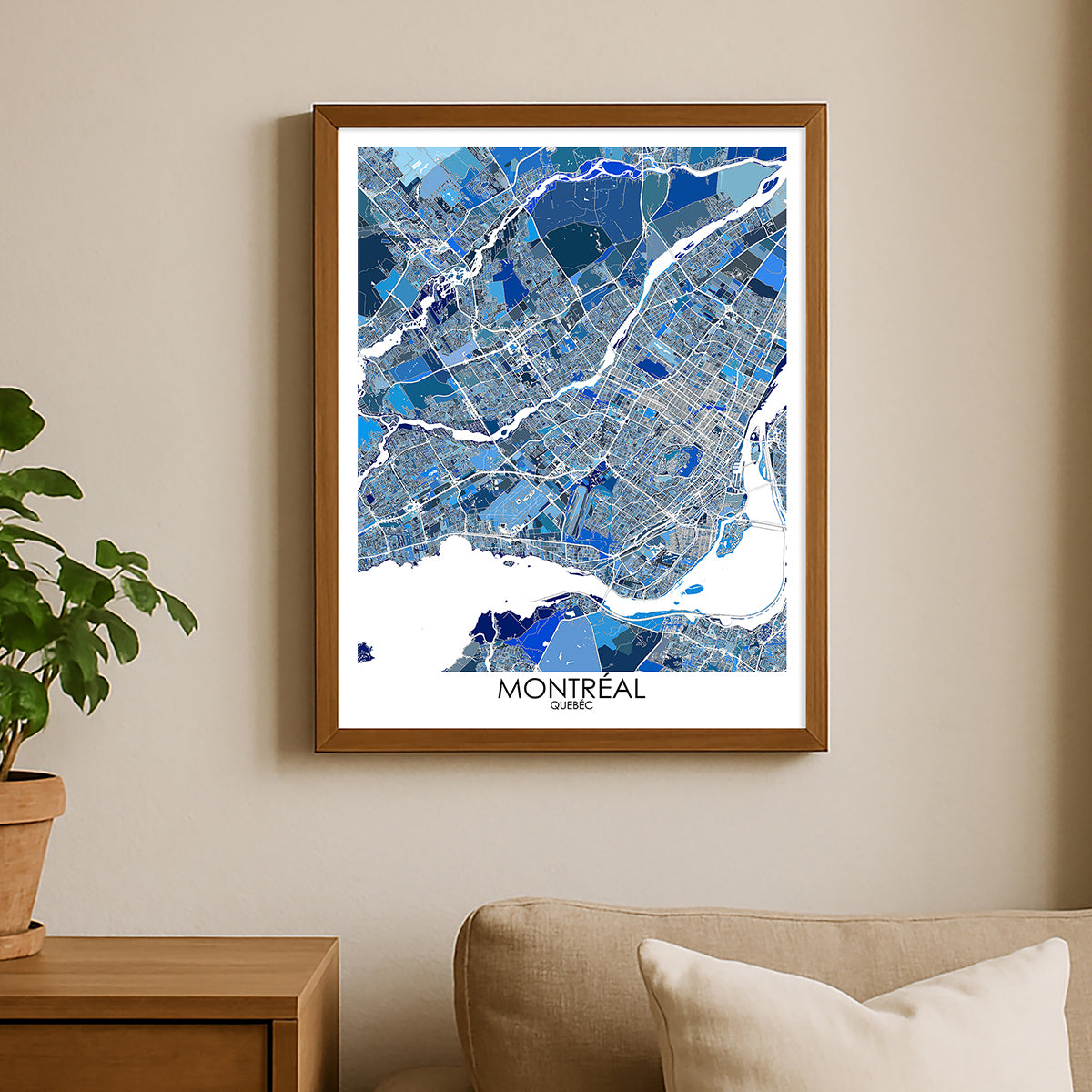 Framed Montreal city map print displayed on a wall above a neutral living room chair.
