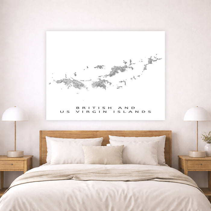 Bedroom with a map of British and US Virgin Islands on the wall above a bed.