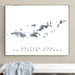 Map of British and US Virgin Islands framed on a wall above a white bench.