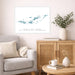 Living room with a gray sofa, wooden cabinet, and decorative items.