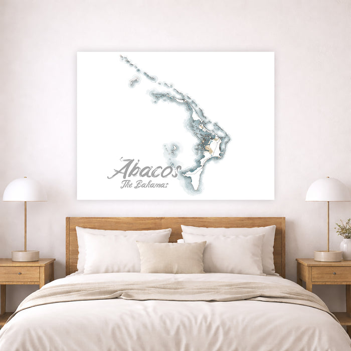 Bedroom with a map of Abaco, The Bahamas on the wall above a bed.
