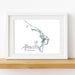 Framed map of Abaco, The Bahamas on a white wall.