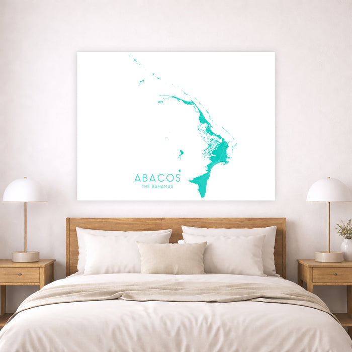 Bedroom with a map of Abacos on the wall above a bed.