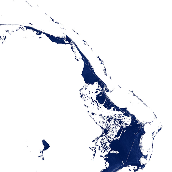 Satellite image of a coastal area with blue water and white landmasses