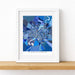 Framed map of Ahmedabad with a blue color scheme on a white background