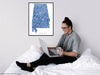 Alabama state map print with a blue geometric design by Maps As Art.