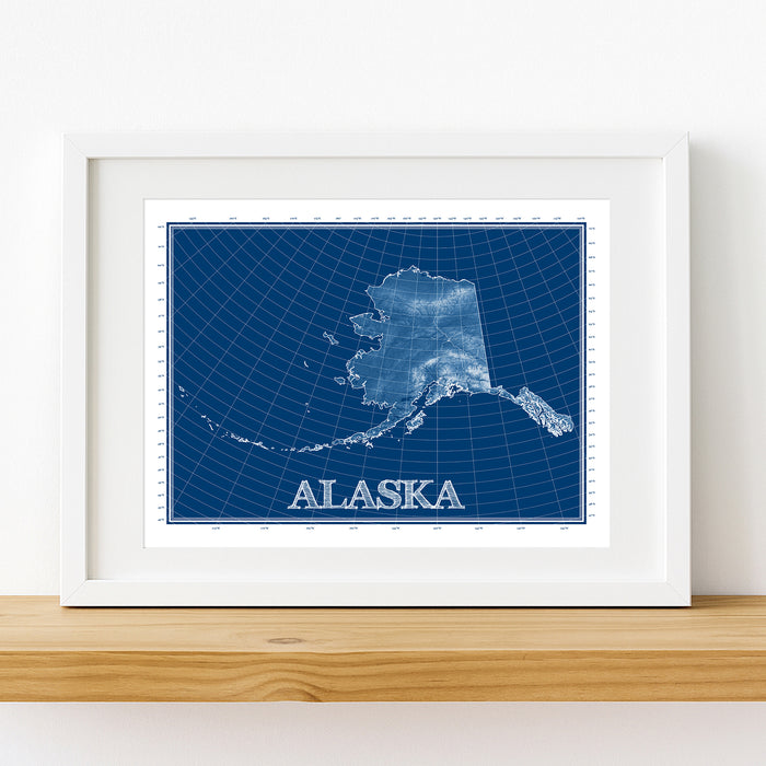 Framed map of Alaska on a white wall