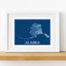 Framed map of Alaska on a white wall