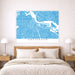 Map of Amsterdam on a wall above a bed in a bedroom setting