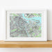 Framed map of Amsterdam on a white wall