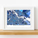 Framed map of Amsterdam on a white wall
