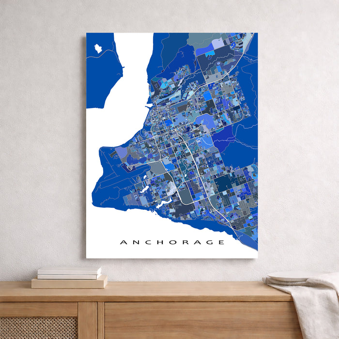 Map of Anchorage on a wall above a wooden surface