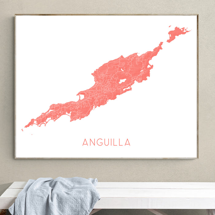 Framed map of Anguilla with a coral color scheme on a wall.