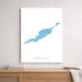 Map of Anguilla on a white wall above a wooden shelf.