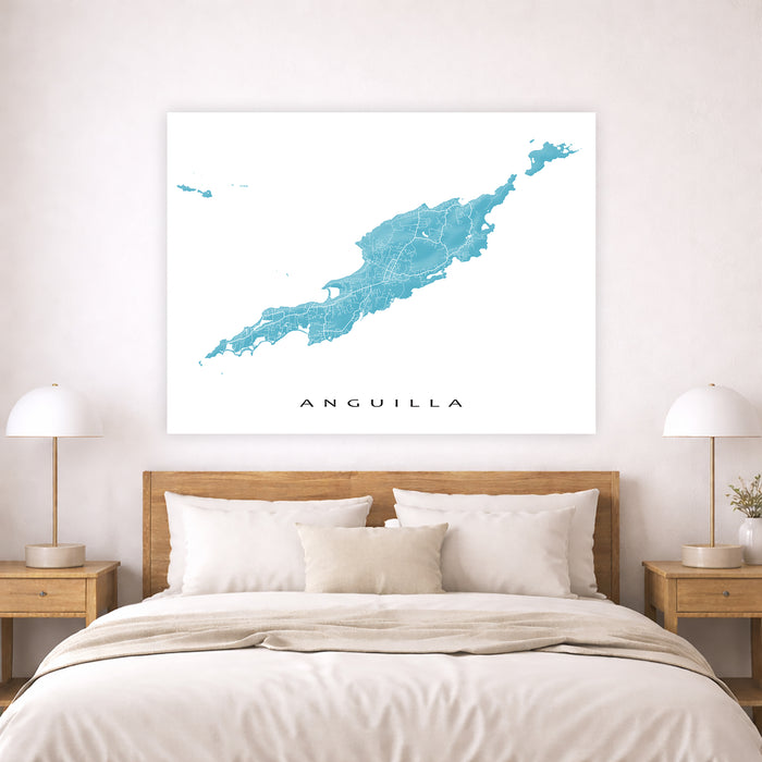 Map of Anguilla on a wall above a bed in a bedroom setting