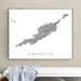Framed map of Anguilla on a wall above a bench with a towel.