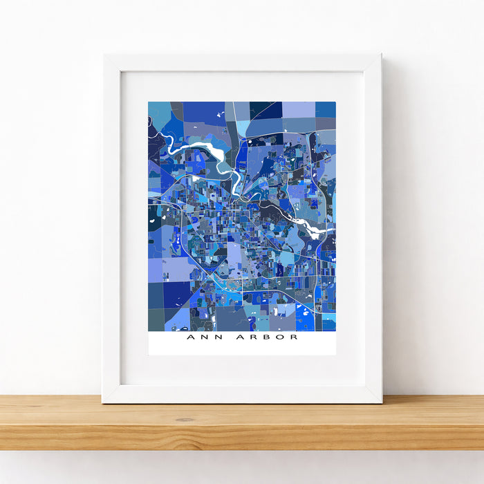 Framed map of Ann Arbor with a blue color scheme on a white surface.
