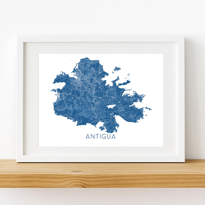 Framed map of Antigua on a white wall
