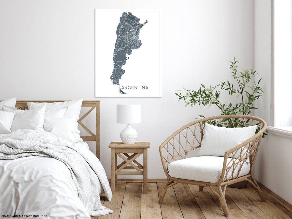 Modern bedroom with a bed, chair, and decorative wall art of Argentina.