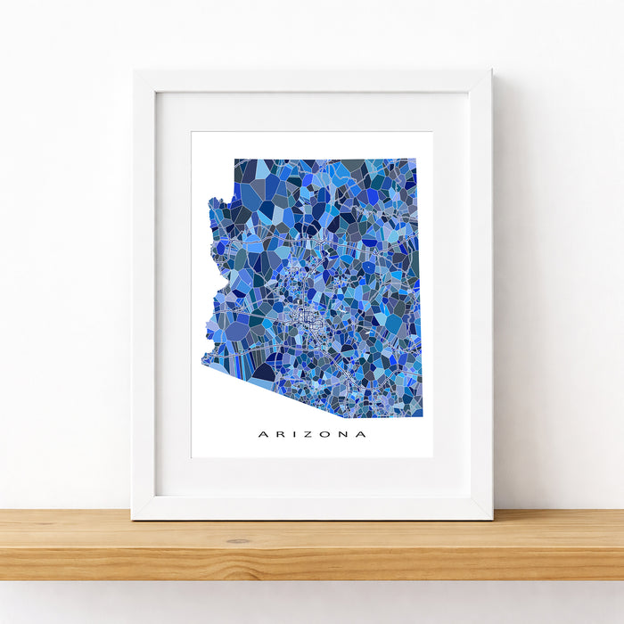 Framed map of Arizona with a blue mosaic pattern on a white background
