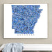 Framed map of Arkansas with a blue mosaic pattern on a beige wall.