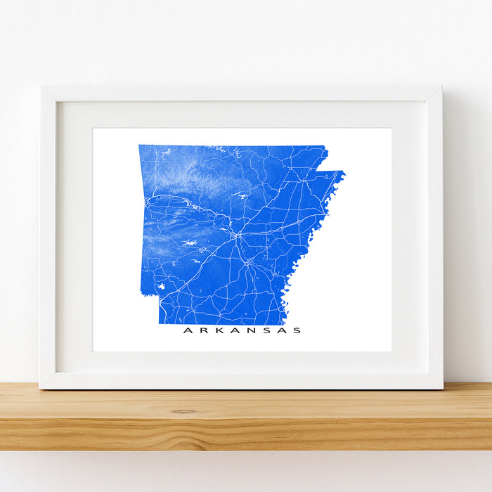 Framed map of Arkansas on a white wall