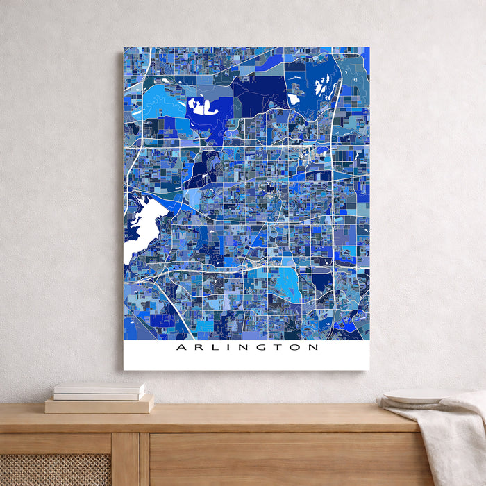 Map of Arlington in blue tones on a white wall above a wooden surface.