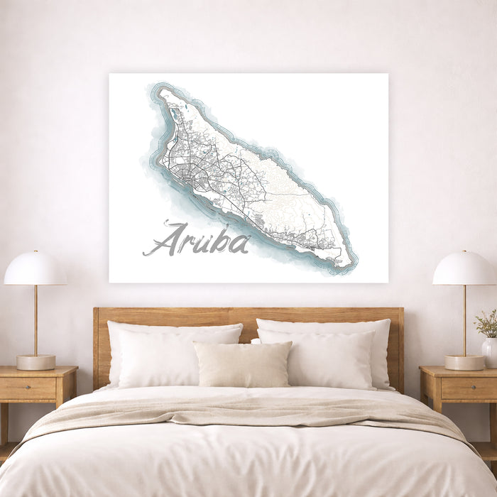 Map of Aruba on a wall above a bed in a bedroom setting