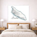 Map of Aruba on a wall above a bed in a bedroom setting