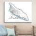 Framed map of Aruba on a wall above a sofa