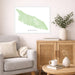 Living room with a map of Aruba on the wall, a couch, and a wooden cabinet.