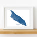 Framed map of Aruba on a white wall