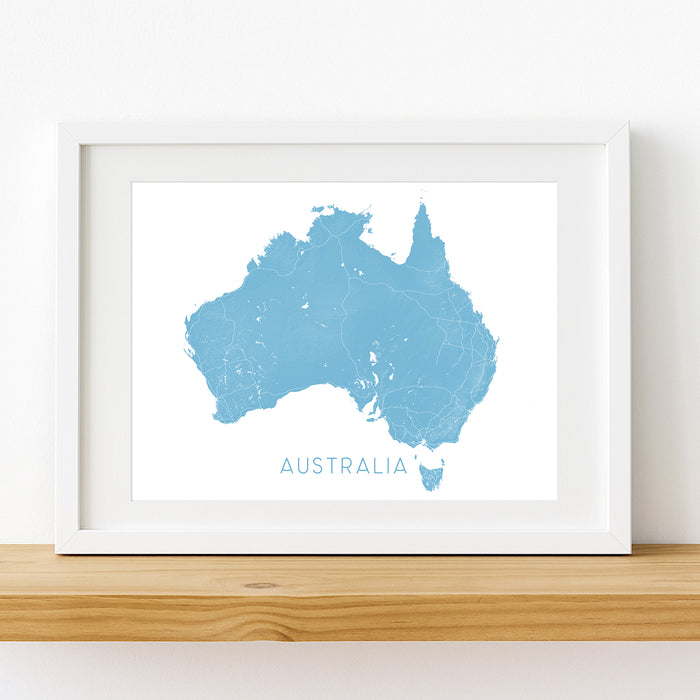 Framed map of Australia on a white wall