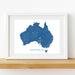 Framed map of Australia on a white wall