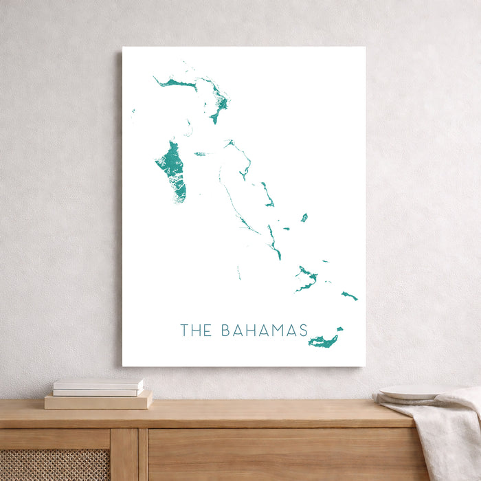 Map of The Bahamas on a white background above a wooden surface.