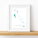 Framed map of The Bahamas on a white wall