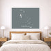 Framed map of The Bahamas above a bed in a bedroom setting