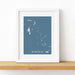 Framed map of The Bahamas on a white wall