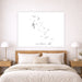 Bedroom with a map of The Bahamas on the wall above a bed.