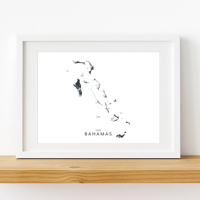 Framed map of The Bahamas on a white wall