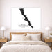 Map of Baja California Peninsula on a wall above a bed in a bedroom.