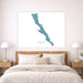 Map of Baja California on a wall above a bed in a bedroom.