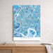 Map of Bangkok in blue tones on a white wall above a wooden shelf.