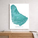 Map of Barbados on a white wall above a wooden surface