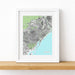 Framed map print of Barcelona on a white wall