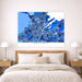 Map of Belfast on a wall above a bed in a bedroom setting