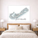 Map of Bermuda on a wall above a bed in a bedroom setting