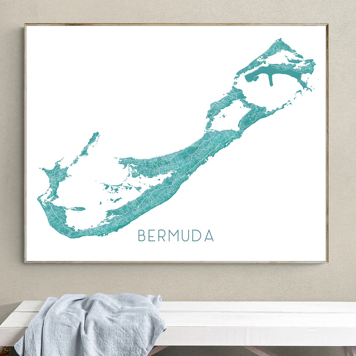 Framed map of Bermuda on a wall above a bench.