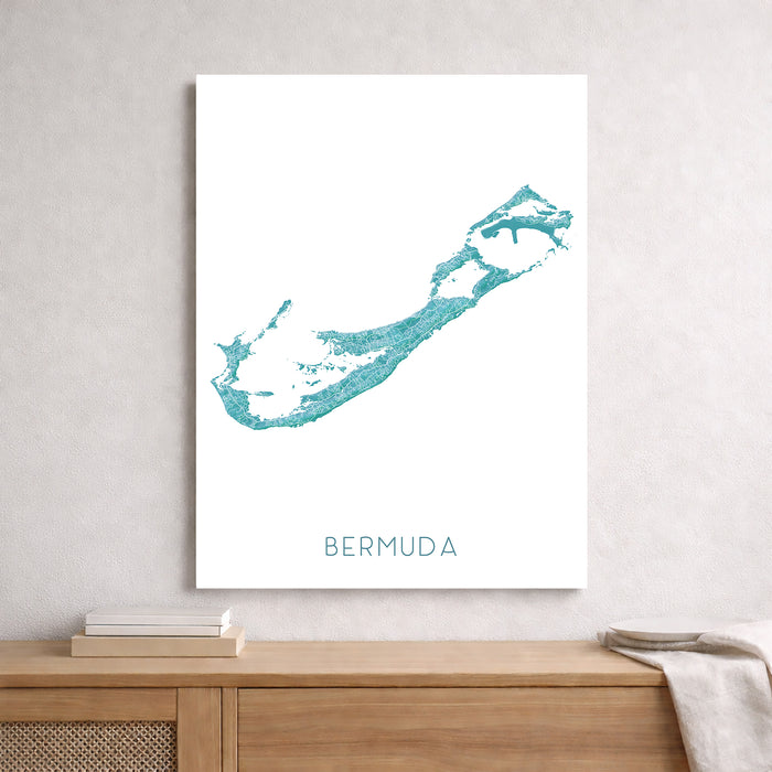 Map of Bermuda in teal color on a white background, framed and displayed on a wall.
