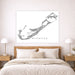 Map of Bermuda on a wall above a bed in a bedroom setting